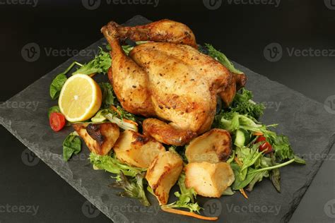 Whole Roasted Grilled Chicken Poultry Bird With Baked Potato Vegetable