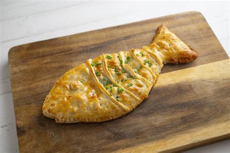 Puff Pastry Stuffed With Tuna Cut Into The Shape Of A Fish Stock Image