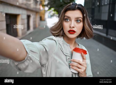 Cute Blonde Red Lips Cup Of Hot Drink Outdoors Stock Photo Alamy