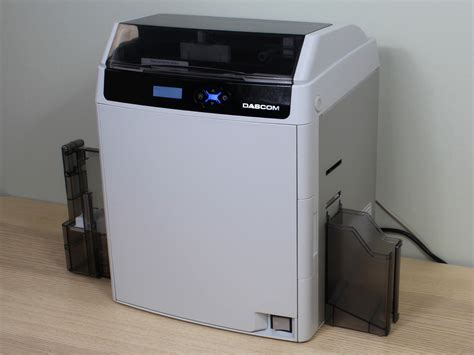 600 dpi и ретрансферная печать: обзор принтера пластиковых карт Dascom ...