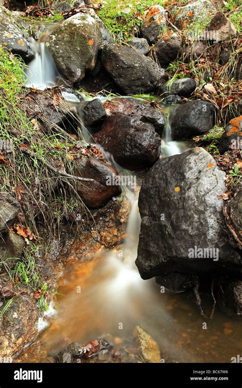 Water Flowing Down Rocks Stock Photo Alamy