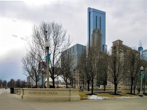 Premium Photo | This photo shows chicago's millennium park during winter the park is surrounded ...