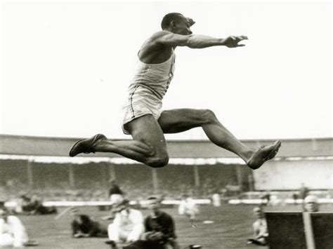 'Jesse Owens in Action at the Long Jump During the Berlin Olympics ...