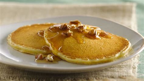 Delicious Cornbread Pancakes With Butter And Pecan Syrup