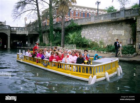 Visitors on a boat tour along the River Walk in San Antonio Texas Stock Photo - Alamy