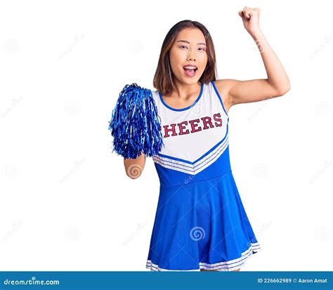 Young Beautiful Chinese Girl Wearing Cheerleader Uniform Holding Pompom