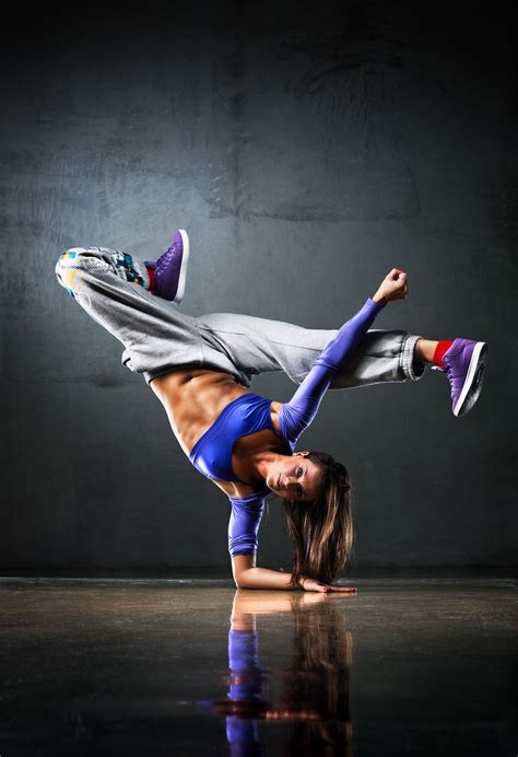 Young Woman Dancer On Wall Background Break Dance Hip Hop Dance