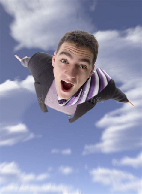 Flying Man Young Man Appears To Be Flying With Mouth Open In An