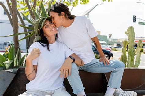 Premium Photo Cute Lesbian Couple Kissing Image In Matching Clothes