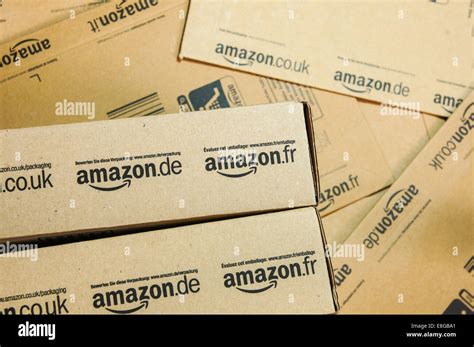 Amazon logo logos on boxes and packages, amazon boxes Stock Photo - Alamy