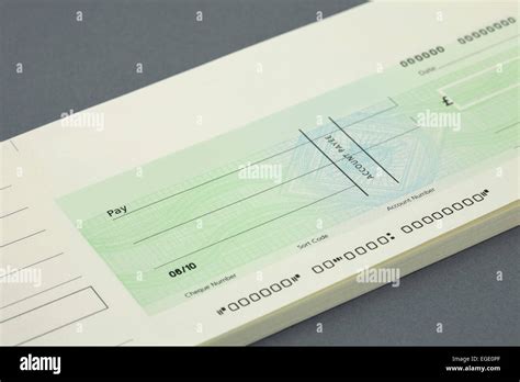 Cheque book with a blank cheque Stock Photo - Alamy