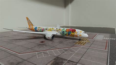 JC WINGS 1 200 SCOOT Pokemon Livery Boeing 787 9 Hobbies Toys Toys