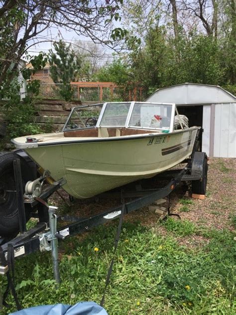 1984 Starcraft aluminum boat (15'-7"), and Trail-Rite trailer ...