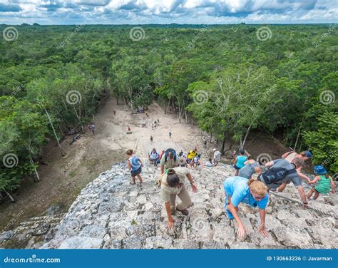 COBA, MEXICO - November, 13, 2013: Group of Tourists Climbing No ...