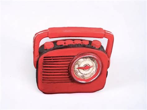 Premium AI Image | Decorative miniature red radio on white background