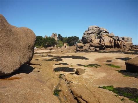 Large Rocks In The Middle Of A Sandy Area