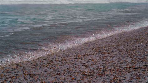 Close up sea waves in sunny day 6302399 Stock Video at Vecteezy