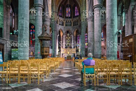 Rear Or Back View Of One Man Sitting In Church Stock Photo Download