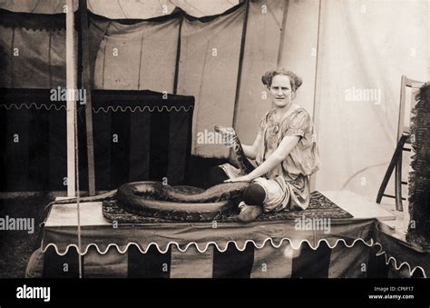 Circus Sideshow Woman Snake Handler Stock Photo Alamy