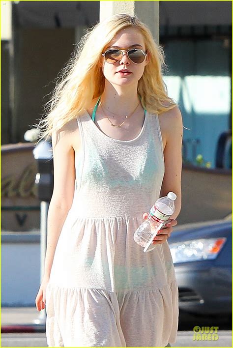 Elle Fanning Shows Bright Bikini In Sheer Dress Photo