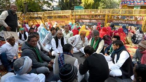 Farmers continue their protest outside Noida authority office ...