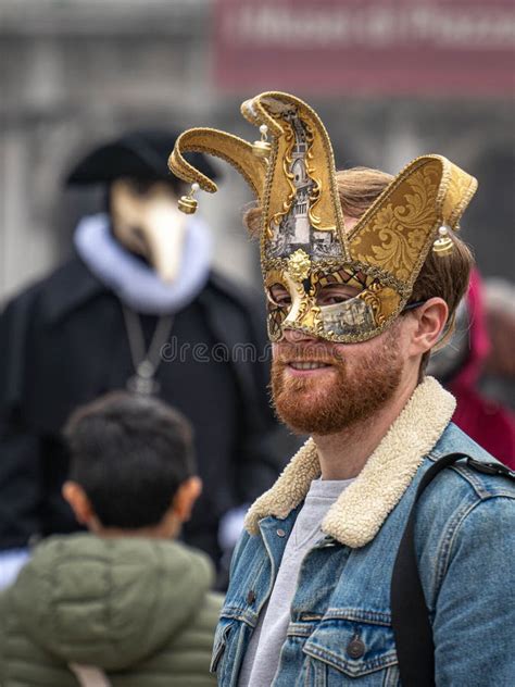 Bearded Red Haired Middle Aged Man In A Jester S Carnival Mask At The