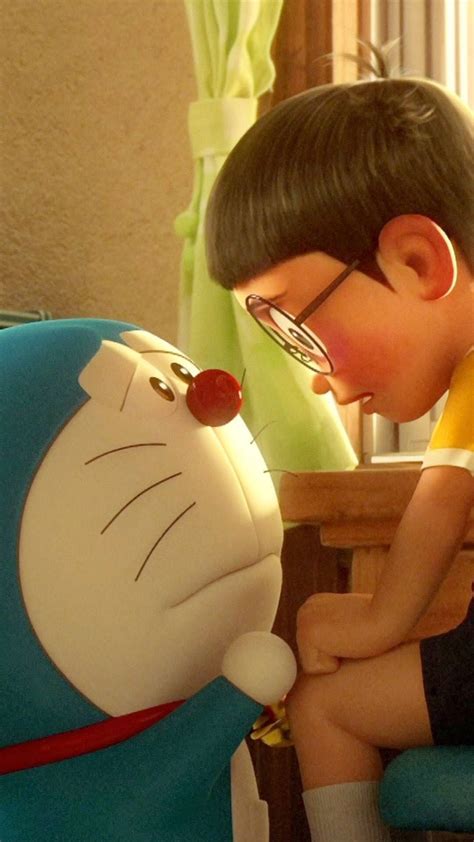 Download Sad Nobita Comforted By Doraemon Wallpaper