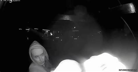 Woman Pulls Naked Flame From Her Dressing Gown In Chilling Doorbell