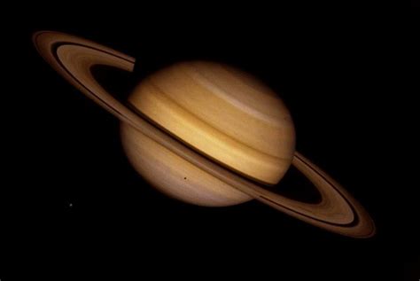 Why Saturns Upper Atmosphere Is So Hot