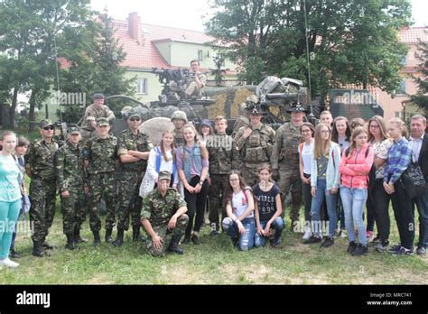 Battle Group Poland Us Uk And Romanian Soldiers Pose With Students