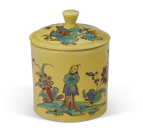 A SAINT CLOUD PORCELAIN YELLOW-GROUND POMADE POT AND COVER, CIRCA 1730