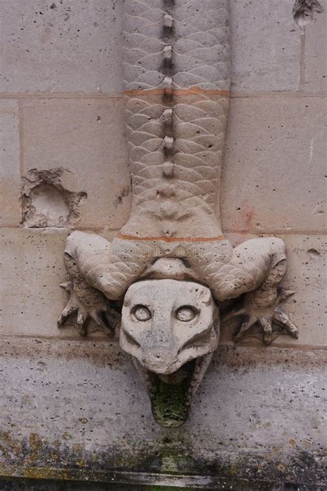 Closeup Of A Lizard Statue On The Wall Of Chateau De Pierrefonds Castle