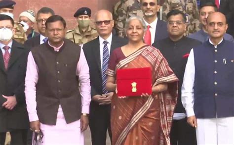 Nirmala Sitharaman Ditches Red Chooses An Orange Handloom Saree For