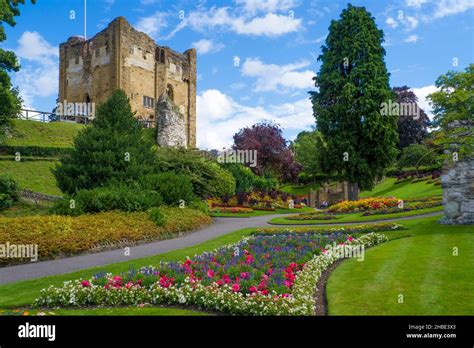 Guildford Castle And Grounds In Springtime With Beds Of Flowers The