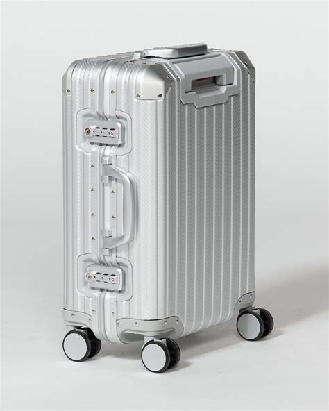 TL172 Dante Small Aluminum Rolling Suitcase Prop Rental - ACME Brooklyn