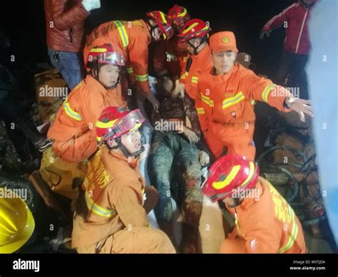 Chinese Rescuers Search For Survivors At The Accident Site After A