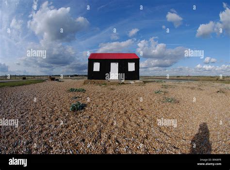 Black And Red Hut On Shingle In Rye Harbour E Sussex Stock Photo Alamy