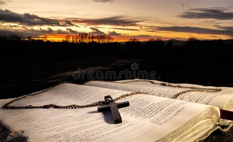 Cross Necklace Bible Dawn stock image. Image of cross - 327156261