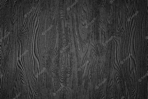 Premium Photo | Simple and realistic black wood panel texture