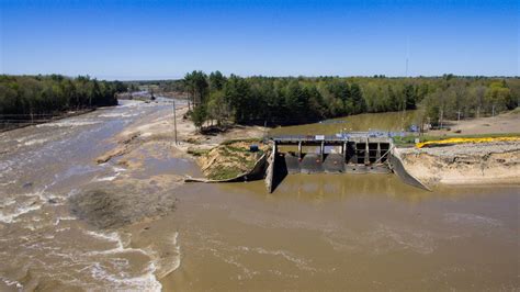 Aerial Photos Show Flood Aftermath Following Dam Failure