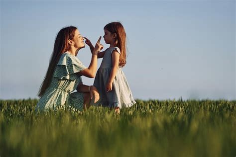 Premium Photo Moment Of Tenderness Mother And Daughter Have Fun