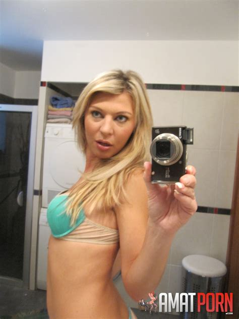 Hot Blonde Amateur Films Herself Stripping Off 15 Photos