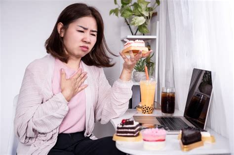 Unhappy Asian Woman Suffering From Toothache Sore Swollen And