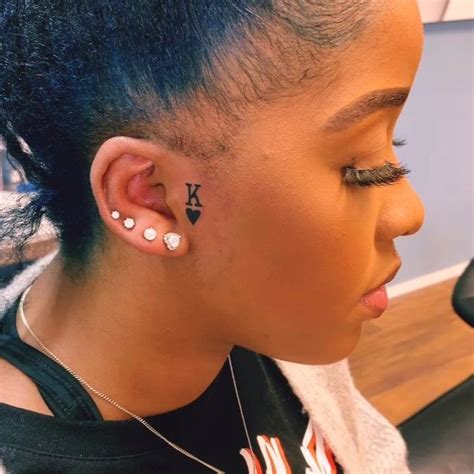 Small Face Tattoos For Women Bold And Beautiful Choices For Your Next