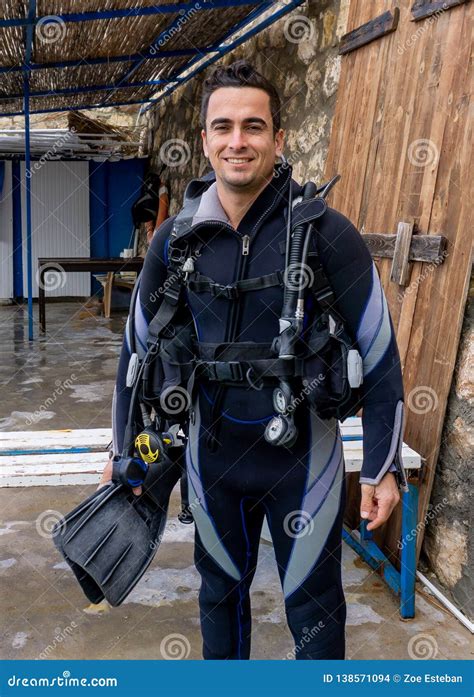 Portrait Of A Young Handsome Man Diver Ready To Go Scuba Diving With