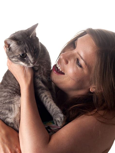 Smiling Beautiful Brunette Holding And Petting Her Cute Grey Cat Stock Photo Image Of