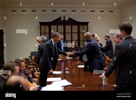 President Barack Obama fist-bumps U.S. Trade Representative Ron Kirk ...