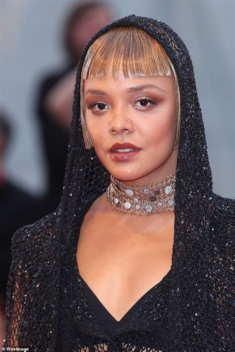 Tessa Thompson Shows Off Her Impeccable Style In A Dazzling Fishnet Ensemble At The Blonde