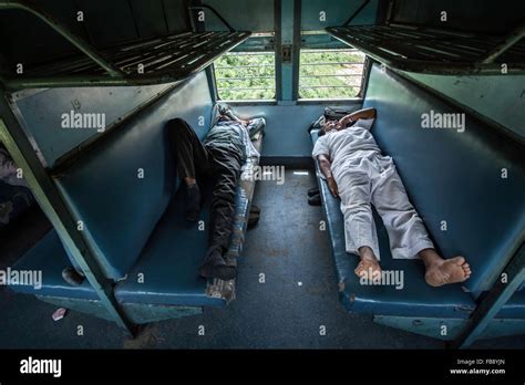 Sleeping and resting on the train. Indian Railways, India Stock Photo ...