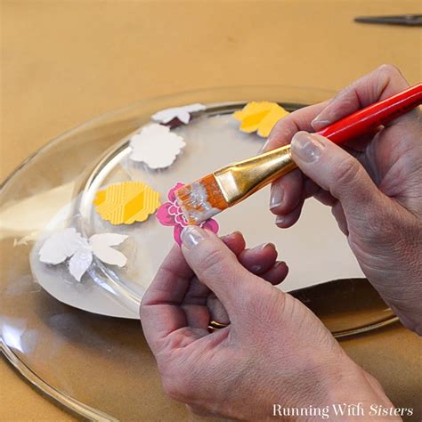 B Decoupage A Glass Plate With Mod Podge Decoupage Flowers Onto